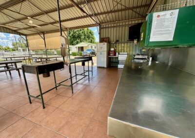 large open camp kitchen space with BBQs